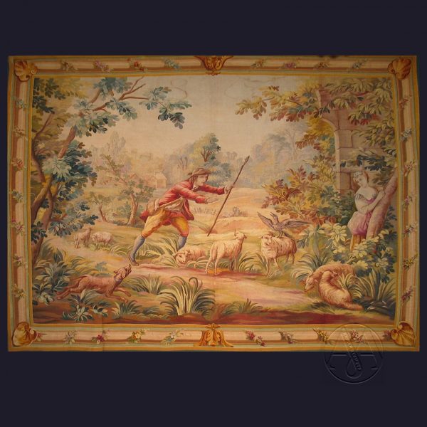 Fine tapisserie pastorale d'Aubusson représentant un berger et une bergère dans un paysage pittoresque