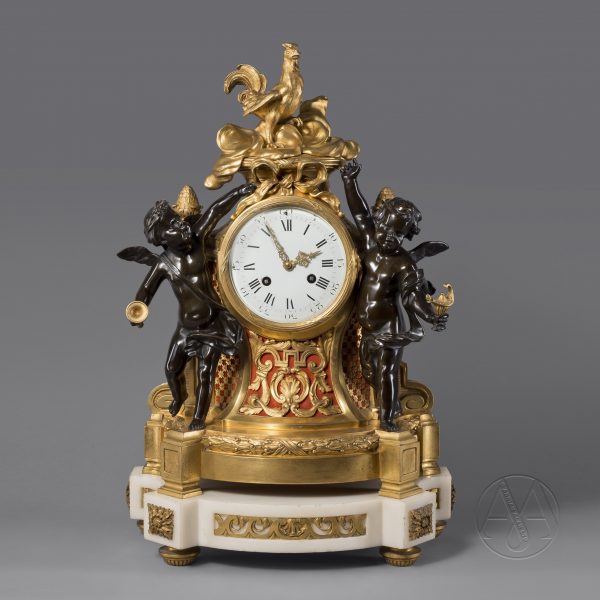 一个精致的路易十六风格的鎏金和斑驳的青铜雕像钟