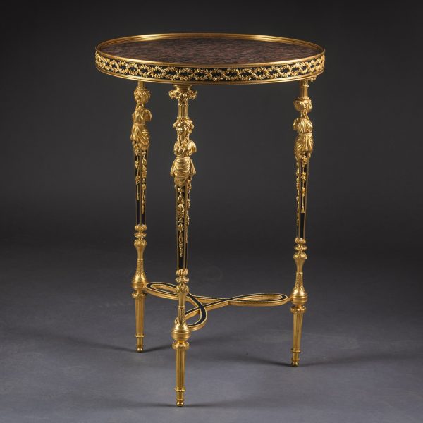 Guéridon en bronze doré de style Louis XVI.