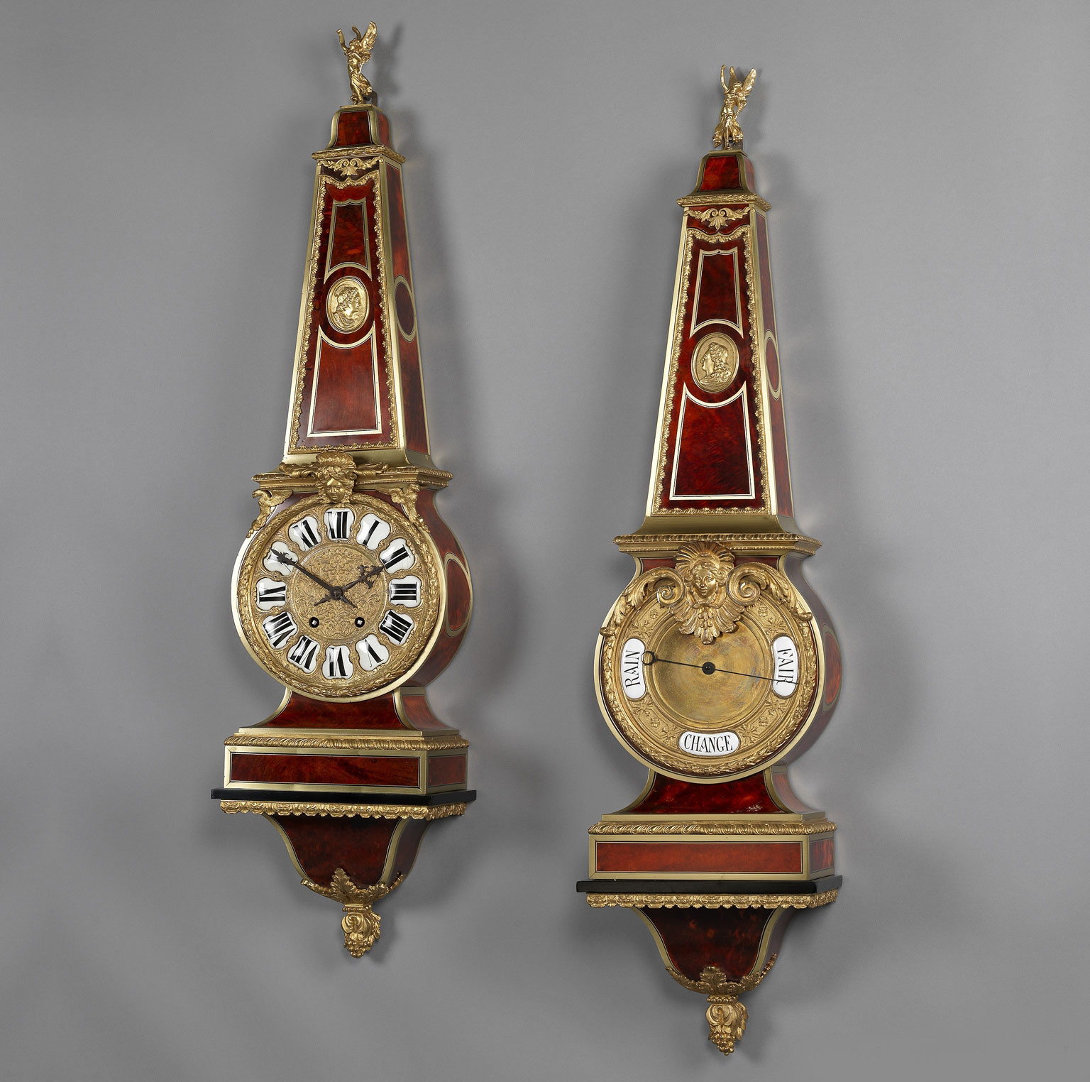 A Gilt-Bronze Mounted Cut-Brass and Tortoiseshell-Inlaid ‘Boulle’ Cartel Clock and Barometer Set.