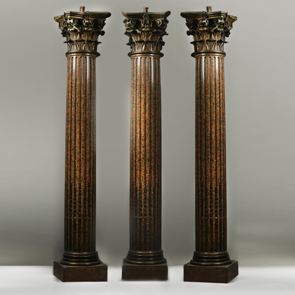 A Set of Three Neoclassical Style Gilt-Bronze and Rose Granite Corinthian Columns After The Model by Pierre Gouthière
