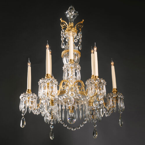 A Gilt-Bronze, Cut and Moulded Glass Nine-Light Chandelier