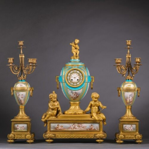 A Fine Napoleon III Gilt Bronze and Porcelain Three Piece Clock Garniture by Raingo Freres