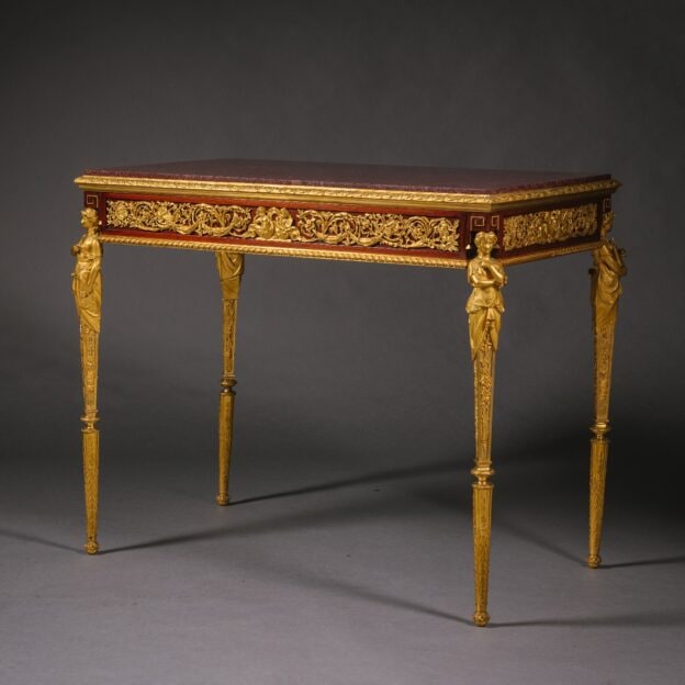 &#039;Table des Arts&#039;. A Gilt-Bronze, Mahogany And Porphyry Table. By Henry Dasson. France, Dated 1889.