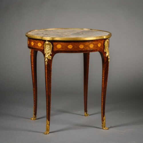 A Louis XV Style Gilt-Bronze Mounted Mahogany and Parquetry Occasional Table