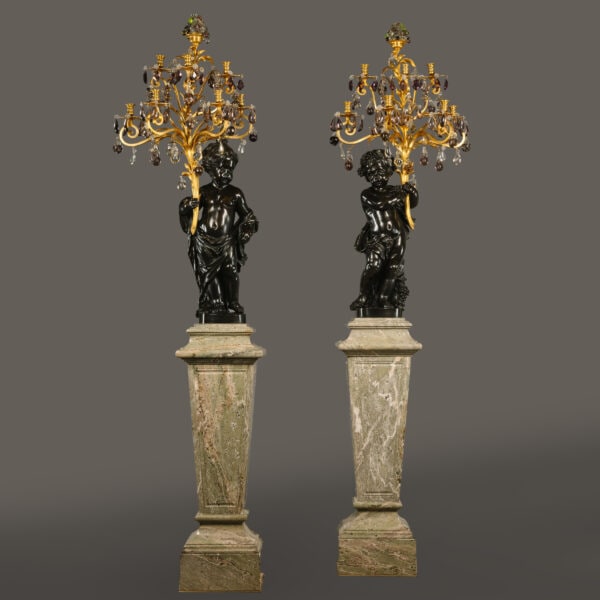 A Pair of Magnificent and Palatial Patinated and Gilt Bronze Figural Seven Light Candelabra on Vert Maurin Marble Pedestal
