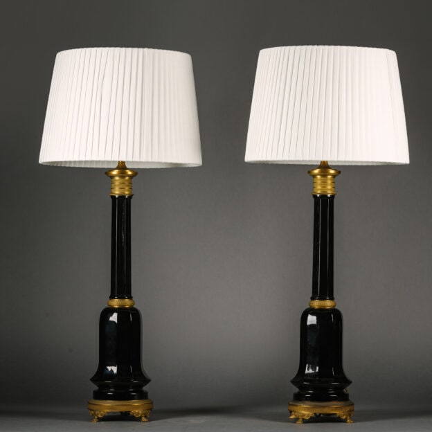 A Pair of Gilt-Bronze and Ruby Glass Table Lamps. Probably France. Circa 1900.