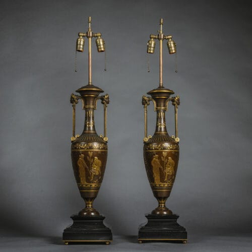 A Pair of Néo-Grec Parcel-Gilt Patinated Bronze Vases Mounted as Lamps, Cast by Ferdinand Barbedienne, from the Model by Henry Cahieux. France, Circa 1870.