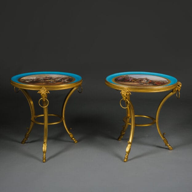 A Fine and Unusual Pair of Napoleon III Gilt-Bronze Low Side Tables With Sèvres-Style Porcelain Tops