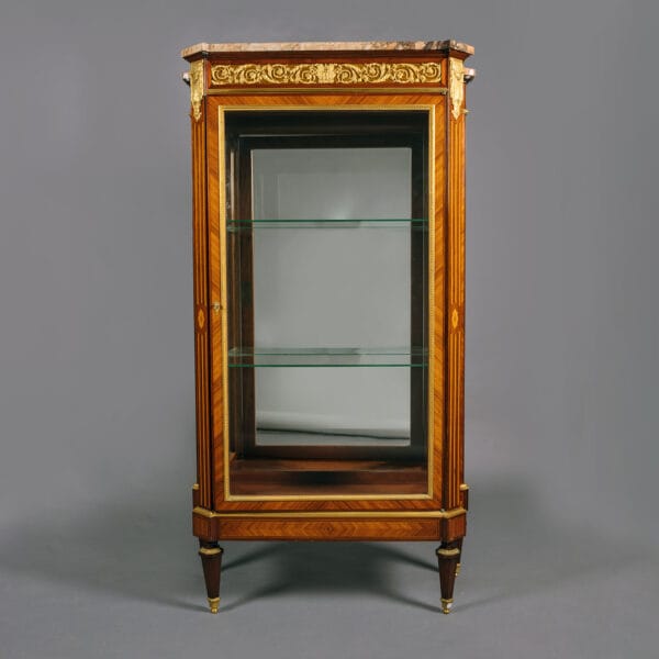 A Louis XVI Style Gilt-Bronze Mounted Mahogany and Bois Satiné Vitrine Cabinet