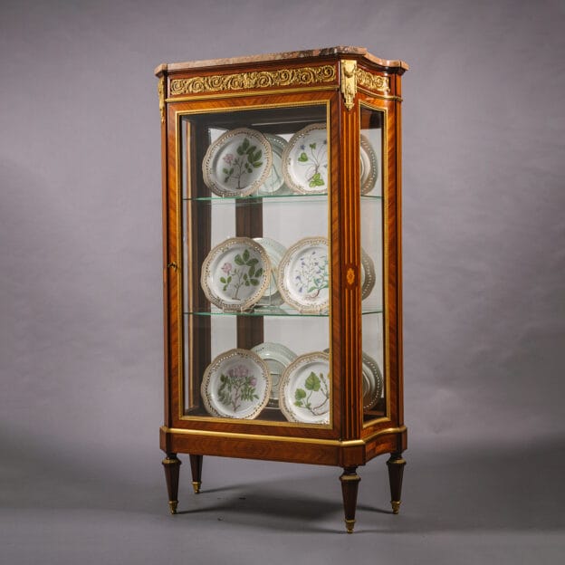 A Louis XVI Style Gilt-Bronze Mounted Mahogany and Bois Satiné Vitrine Cabinet