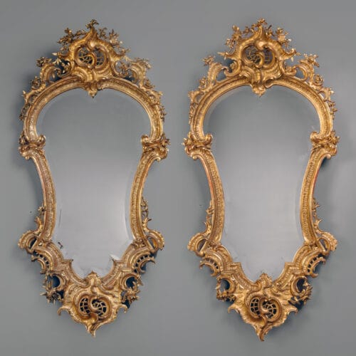 A Rare and Large Pair of Florentine Cartouche-Shaped Giltwood Wall Mirrors