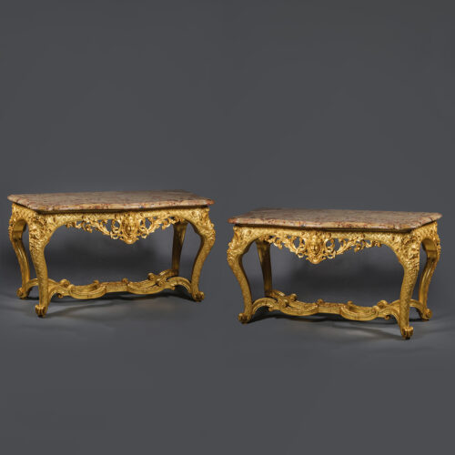 A Pair of Regence Style Carved Giltwood Console Tables