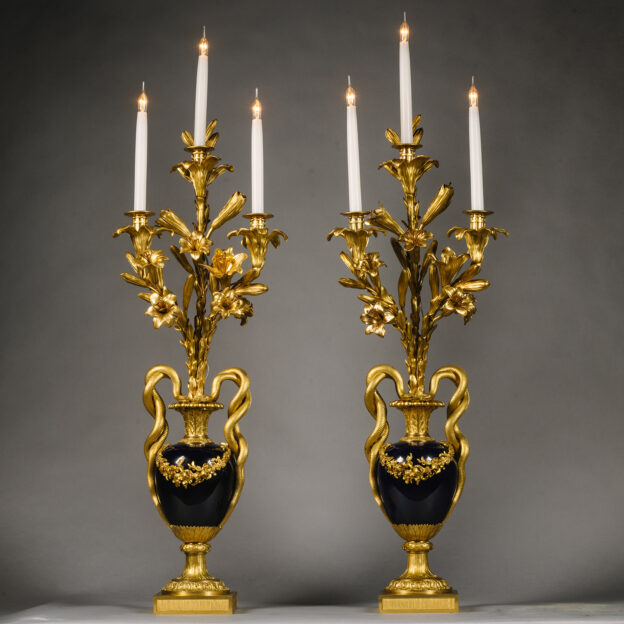 A Pair Of Louis XVI Style Gilt-Bronze And Royal Blue Sèvres-Style Porcelain Three-Light Vase Candelabra