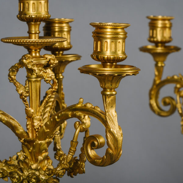 A Pair Of Louis XVI Style Gilt-Bronze And Royal Blue Sèvres-Style Porcelain Three-Light Vase Candelabra