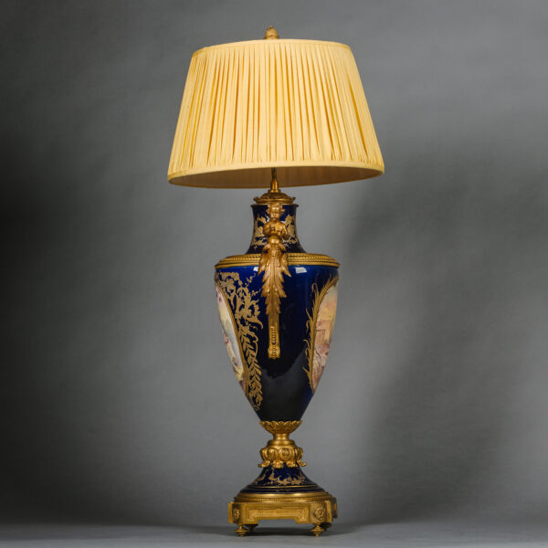 A Louis XVI Style Gilt-Bronze and Sèvres Style Cobalt-Blue Ground Porcelain Vase, Fitted as a Lamp