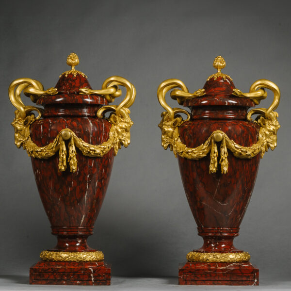 A Pair of Large Louis XVI Style Gilt-Bronze Mounted Rouge Griotte Vases and Covers. France, Circa 1870-90.