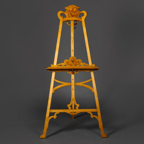 This elegant gallery easel is designed in the Art Nouveau Style of the École de Nancy and Louis Majorelle.