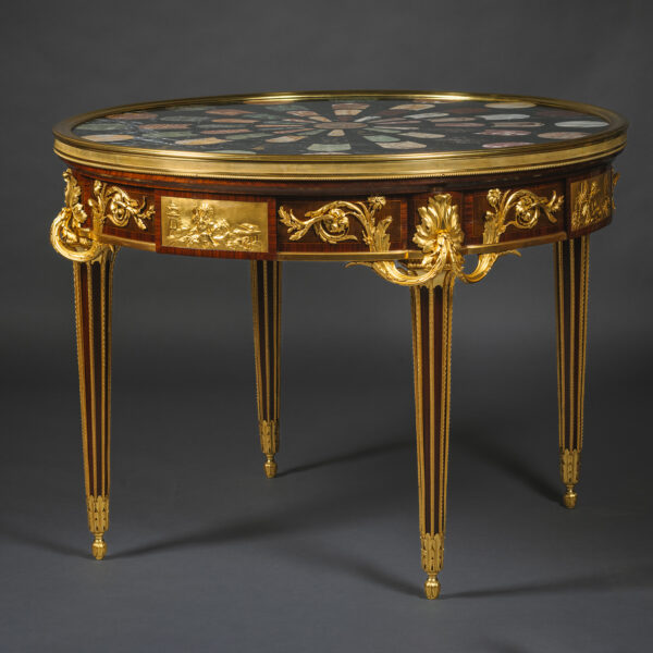 A Rare and Important Gilt-Bronze Mounted Mahogany Centre Table with 'Pietre Dure' Specimen Marble Top, By François Linke.