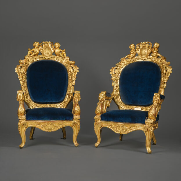 A Pair of Magnificent Giltwood Armchairs. Thrones