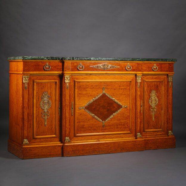 An Empire Style Gilt-Bronze Mounted Satinwood Buffet Cabinet.