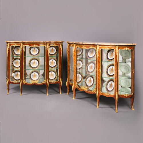 A Near Pair of Belle Epoque Gilt-Bronze Mounted Mahogany Vitrine Cabinets