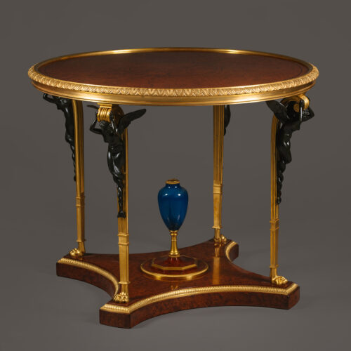 A Louis XVI Style Patinated and Gilt-Bronze Mounted Centre Table, By François Linke