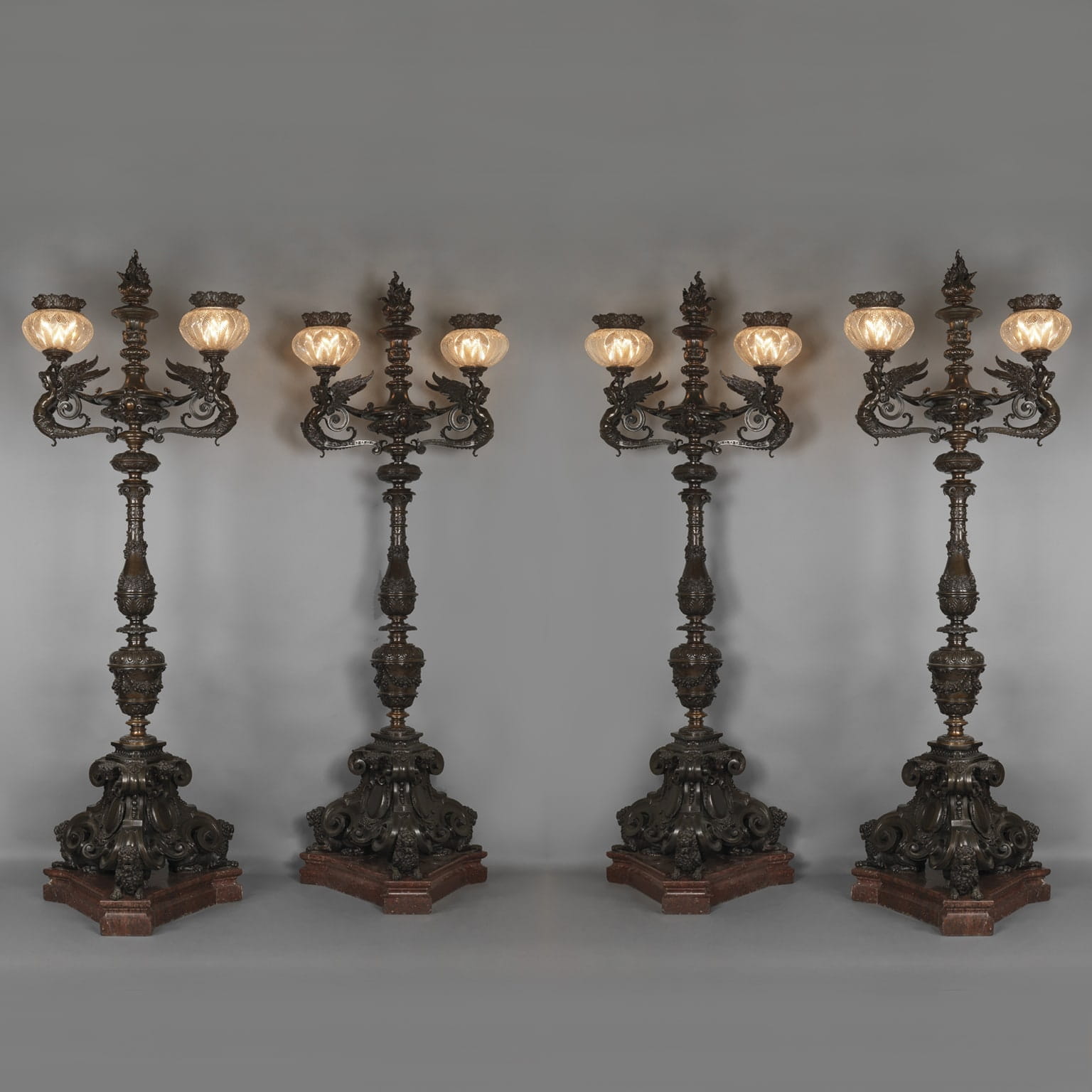 A Rare Set of Four Highly Important Bronze Torchères