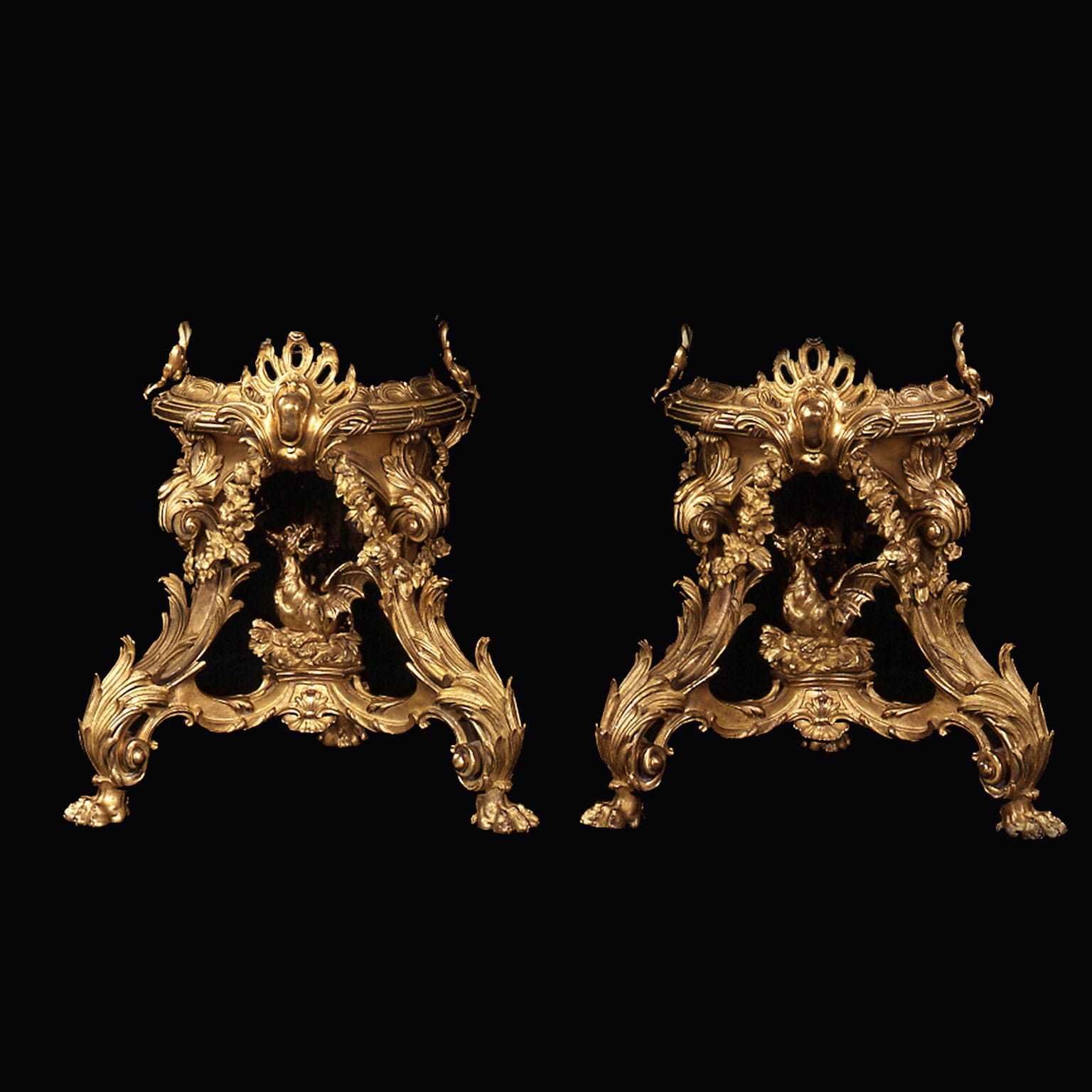 An Exceptional Pair of Gilt-Bronze Dragon Stands