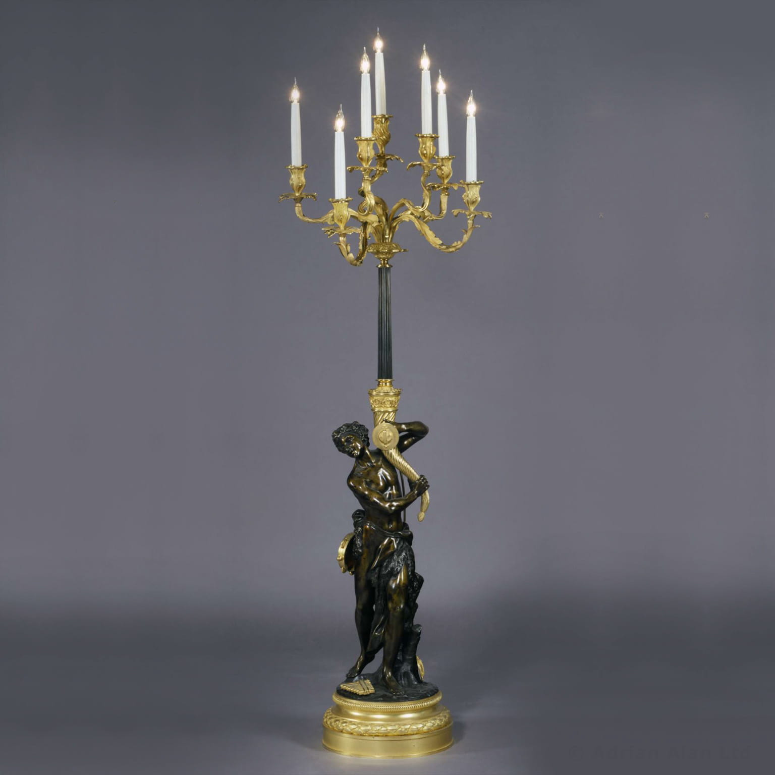 A Very Fine Gilt and Patinated Bronze Floor Standing Candelabrum