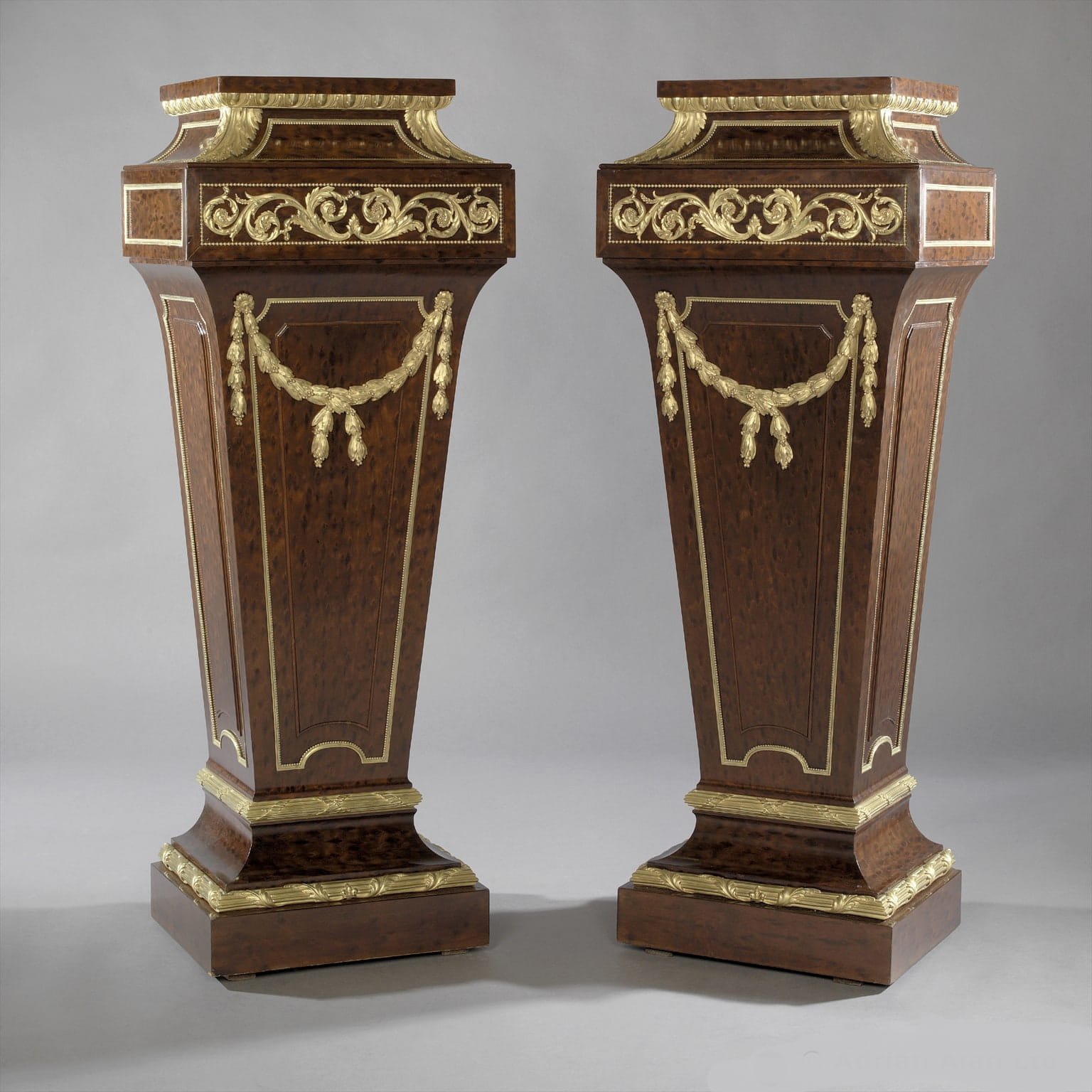 A Very Fine Pair of Louis XVI Style Gilt-Bronze Mounted Mahogany Pedestals