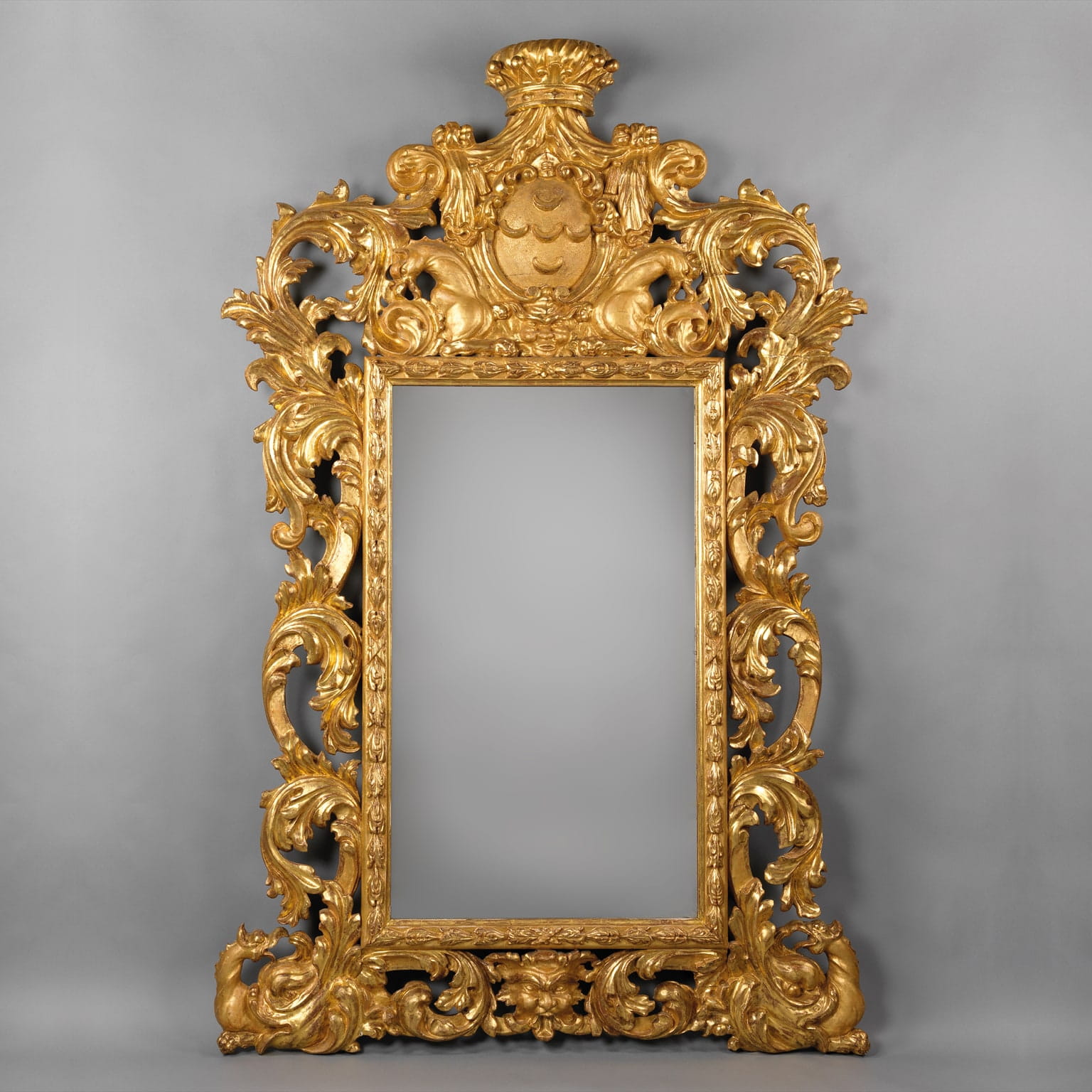 A Large and Impressive Baroque Style Carved Giltwood Mirror