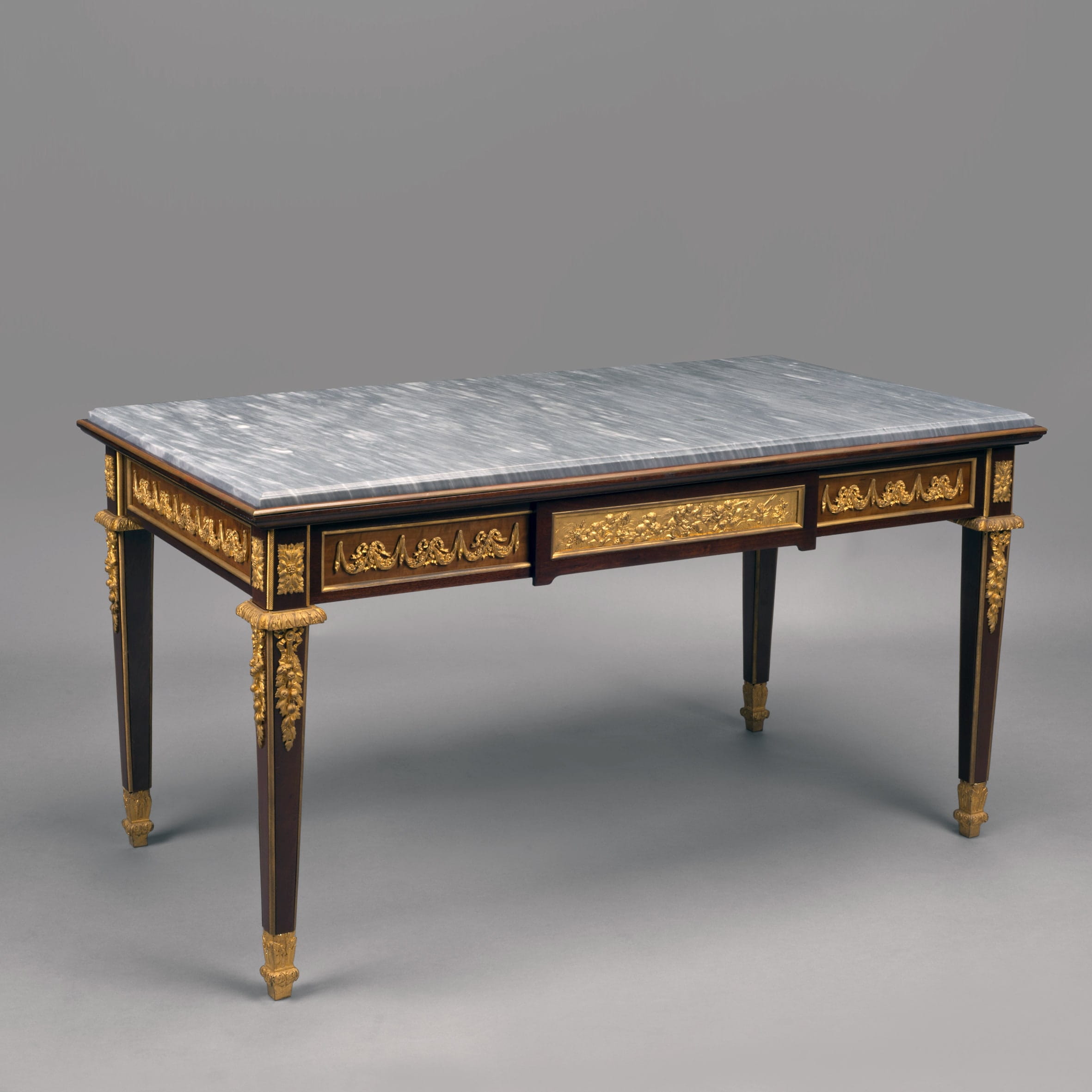 A Louis XVI Style Gilt-Bronze Mounted Mahogany Low Table