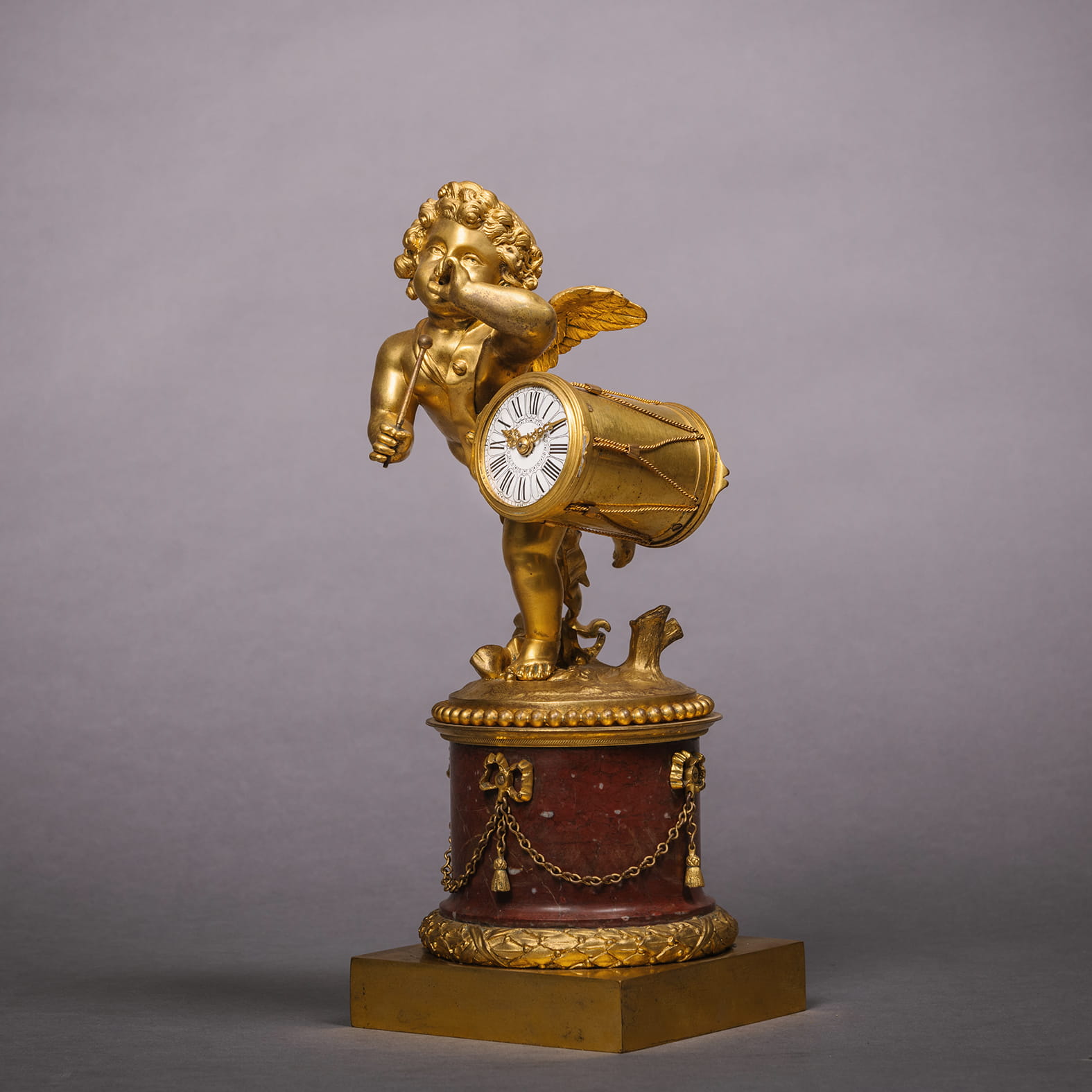 A Fine Rouge Marble Figural Timepiece and Garniture - Image 2