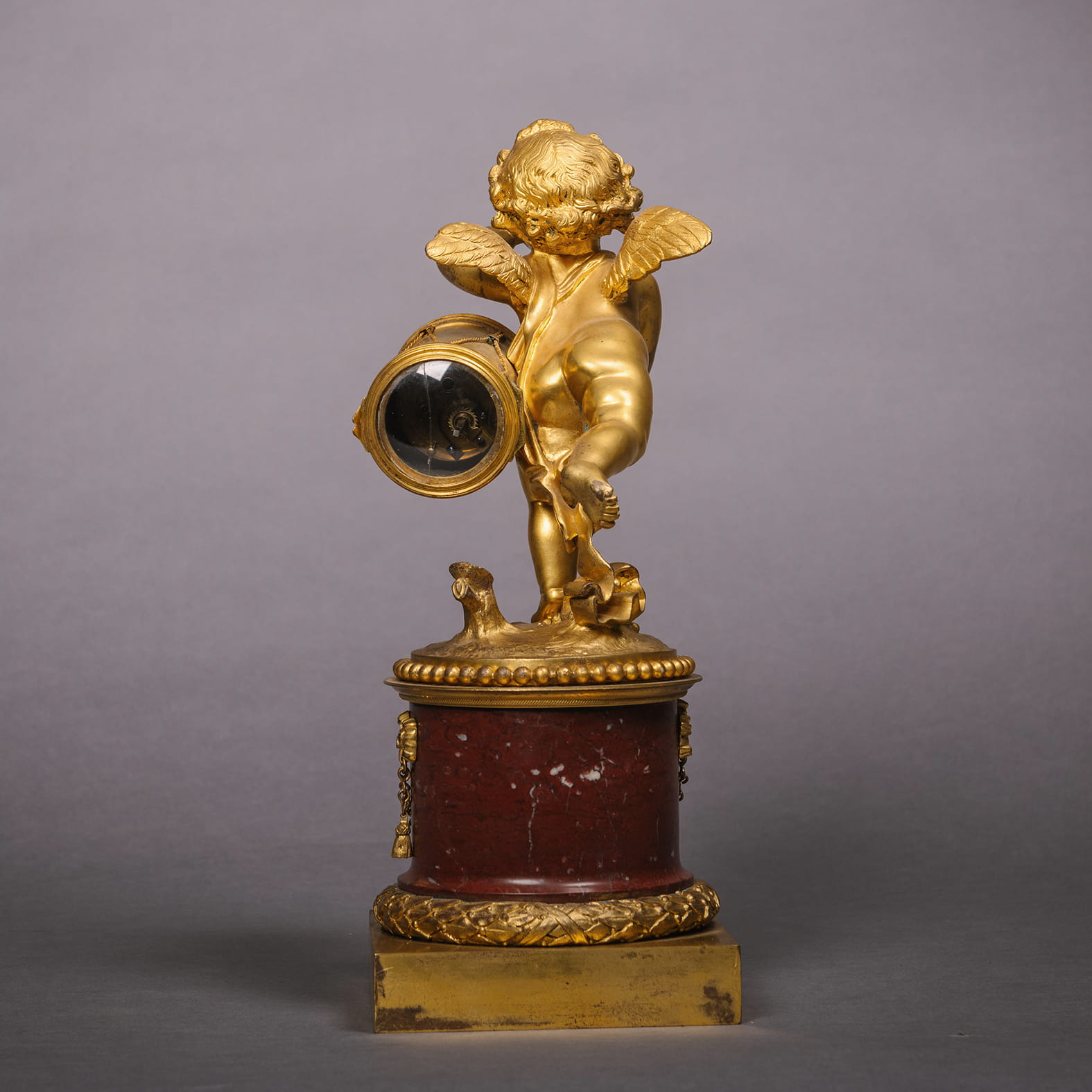 A Fine Rouge Marble Figural Timepiece and Garniture - Image 3