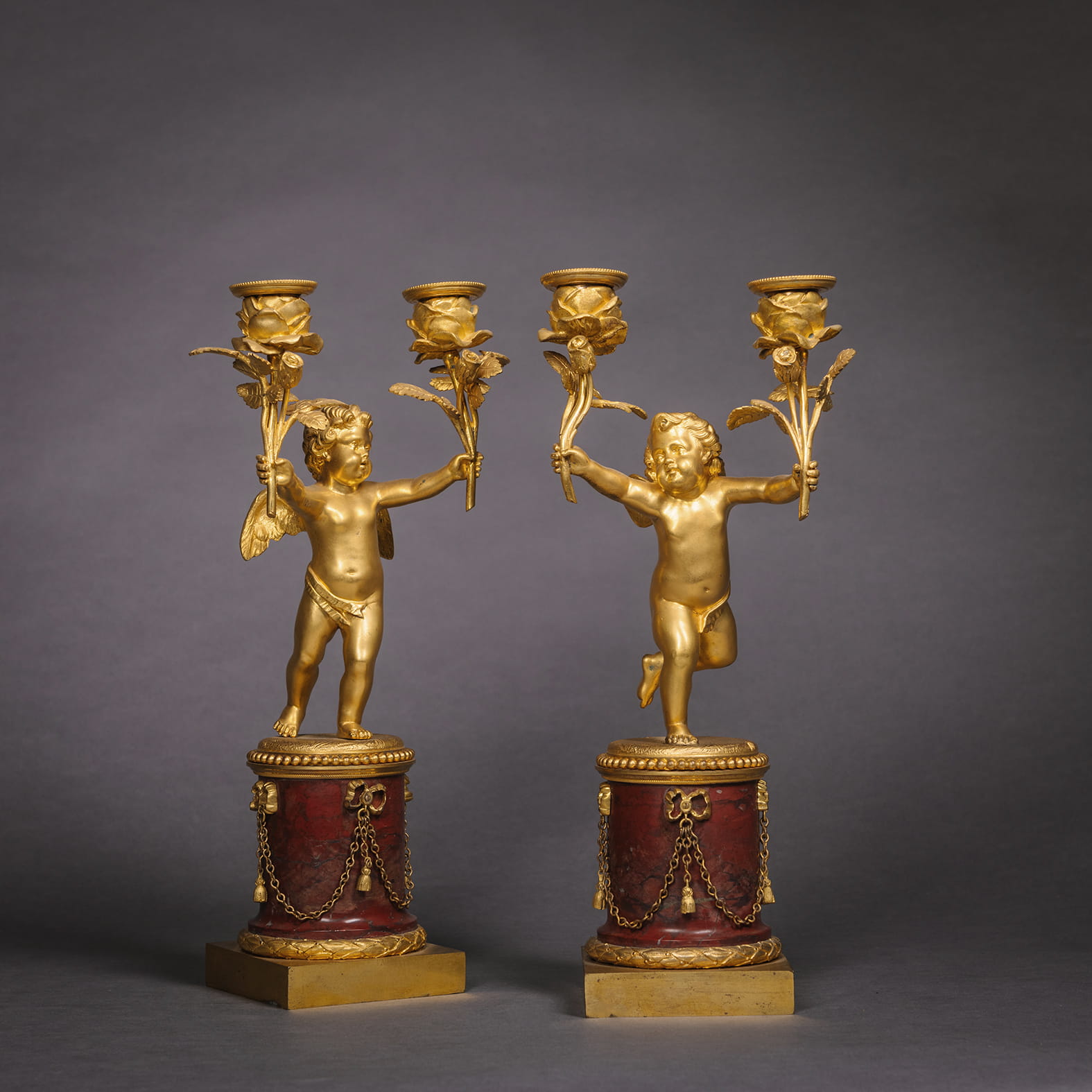 A Fine Rouge Marble Figural Timepiece and Garniture - Image 4
