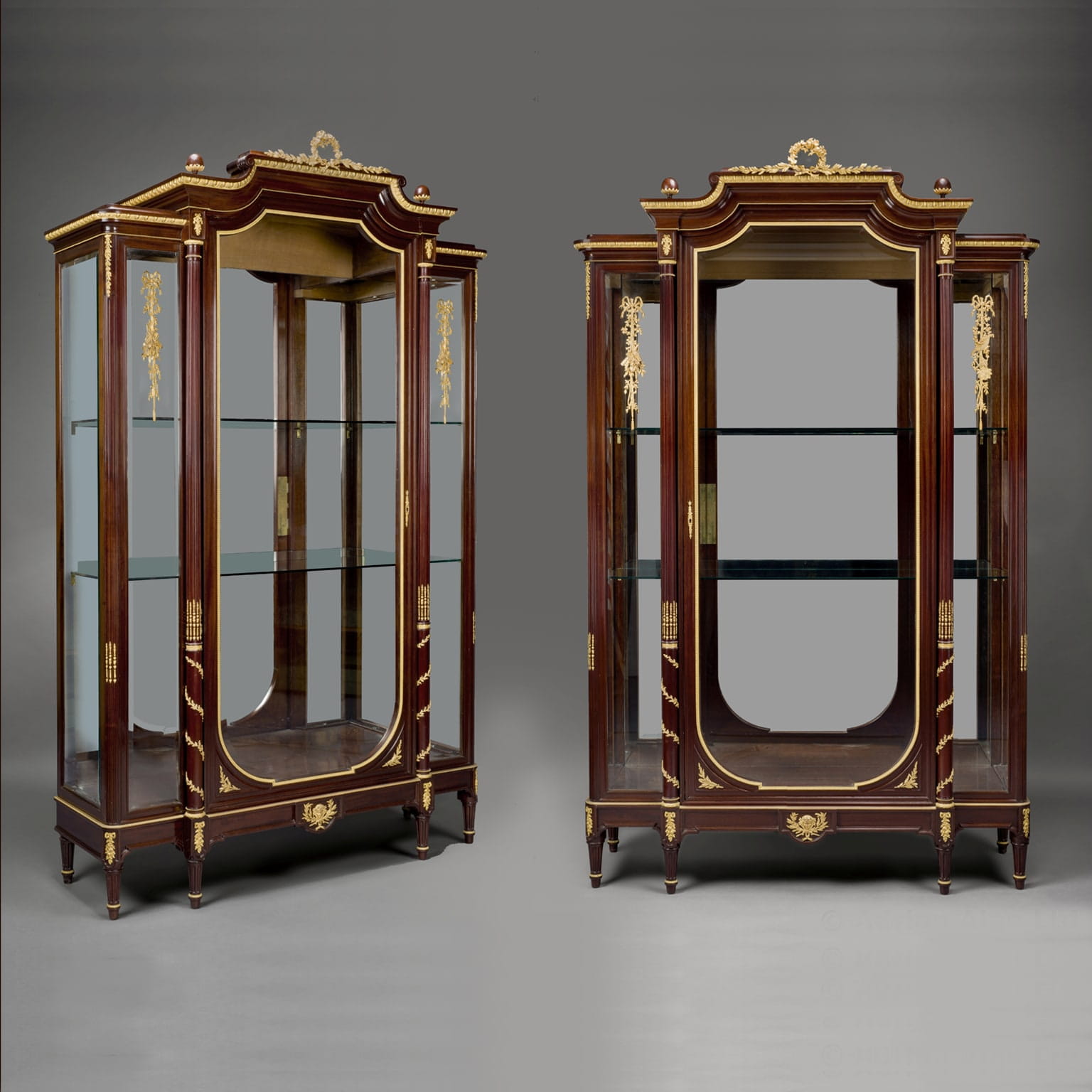 A Pair of Louis XVI Style Mahogany Vitrines - Image 2