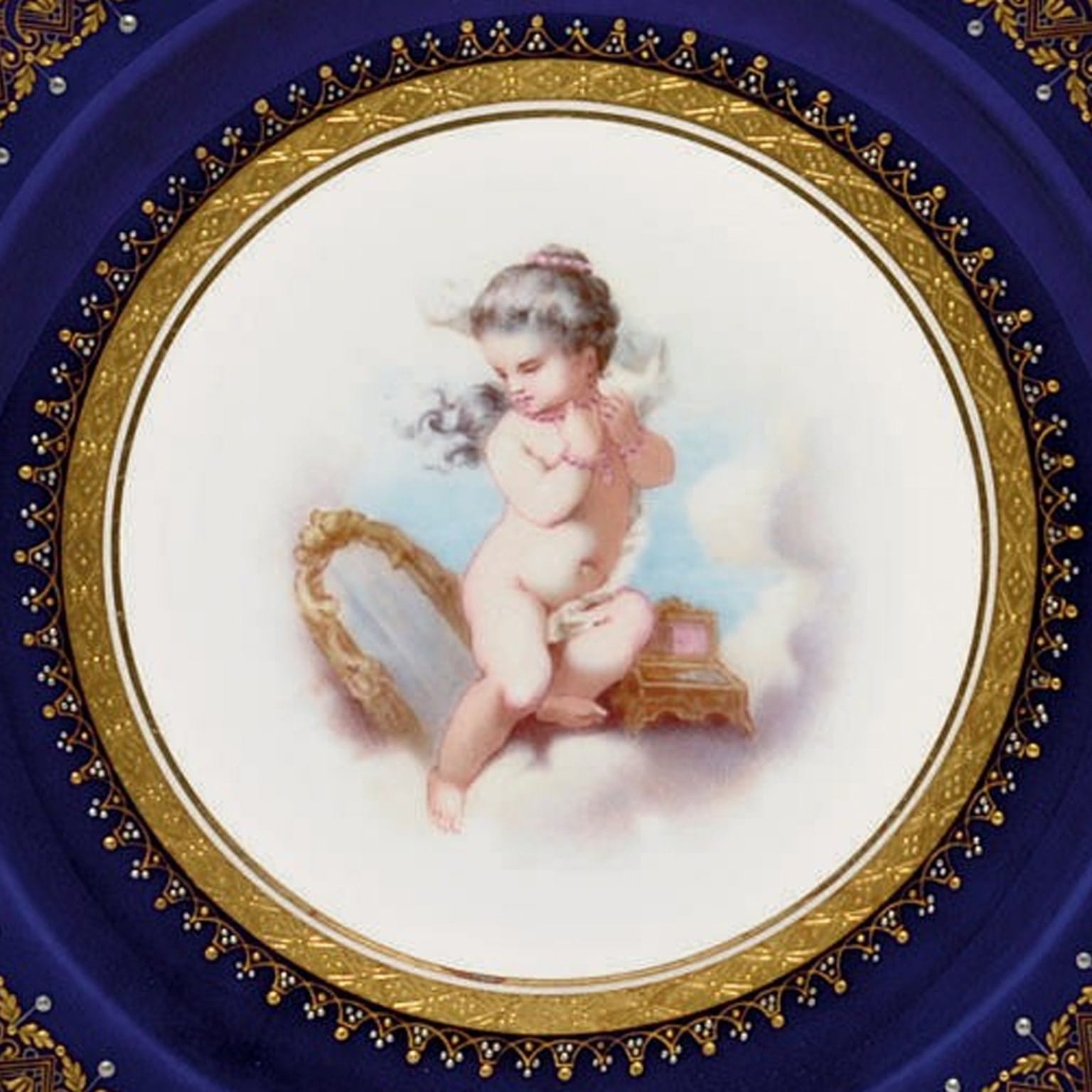 A Very Decorative Pair of Porcelain Plates Depicting Putto at Play - Image 2