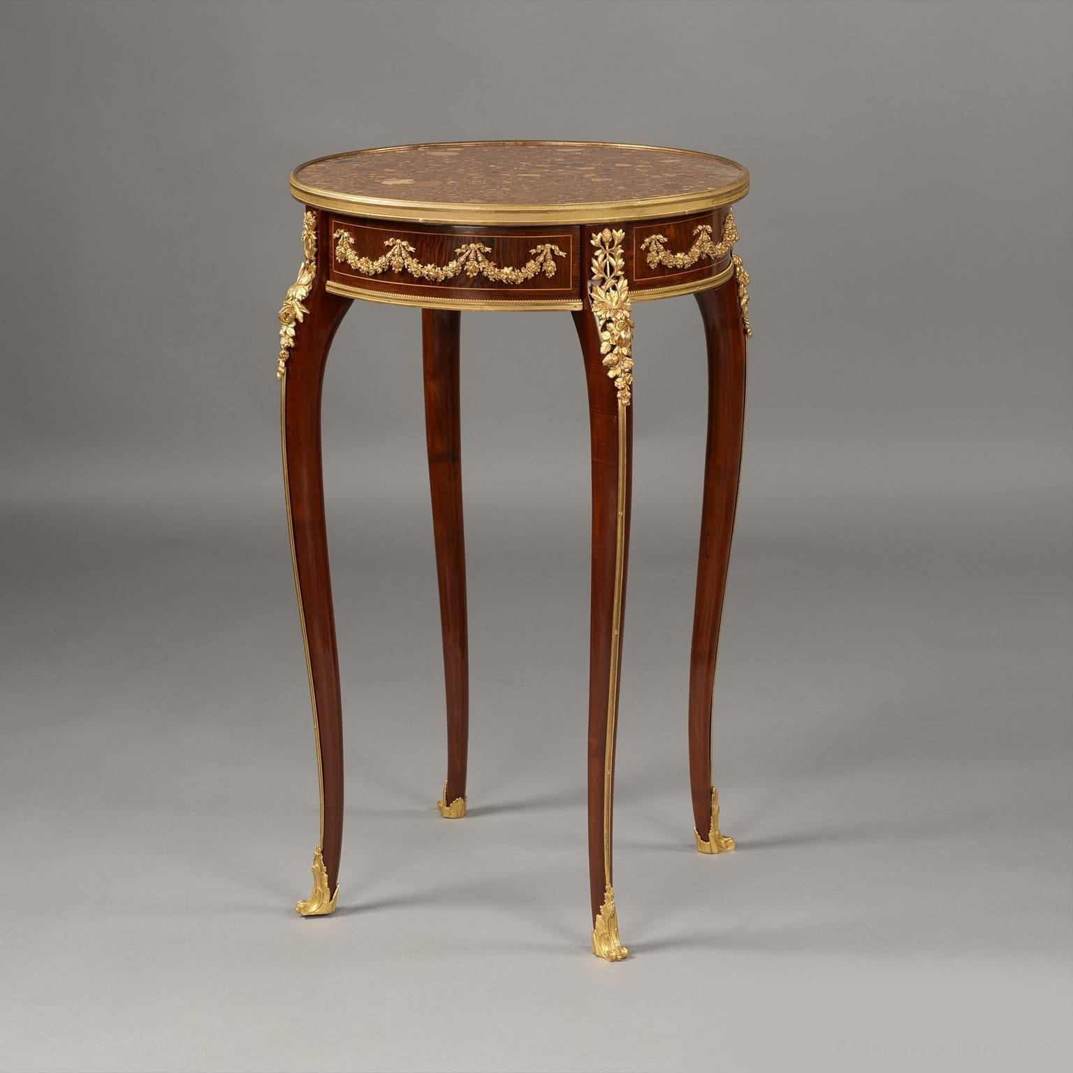 A Gilt-Bronze Mounted Mahogany Table Ambulante