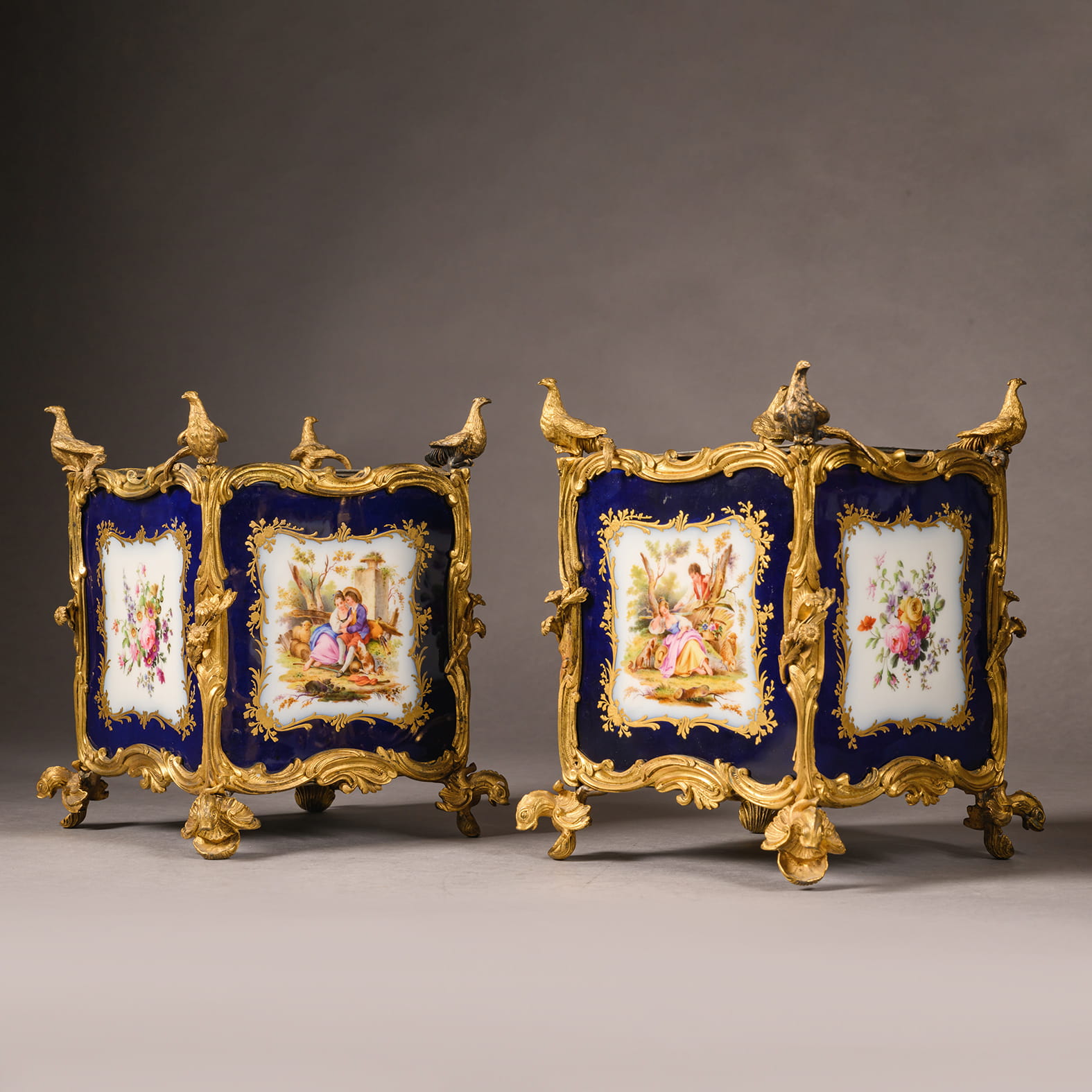 A Rare Pair of Louis XV Style Porcelain Jardinières