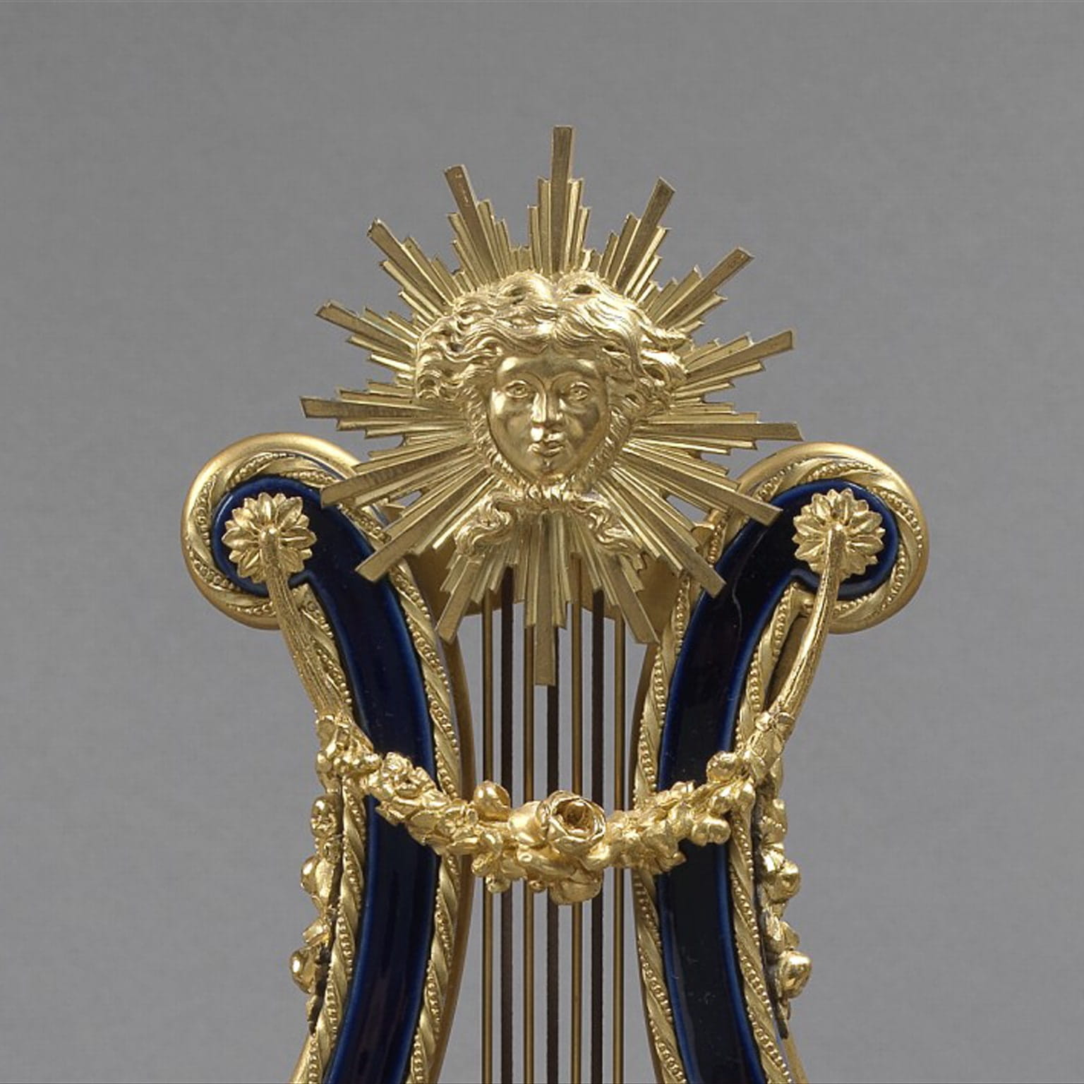 A Fine Louis XVI Style Cobalt Blue Porcelain Lyre Clock Garniture - Image 3