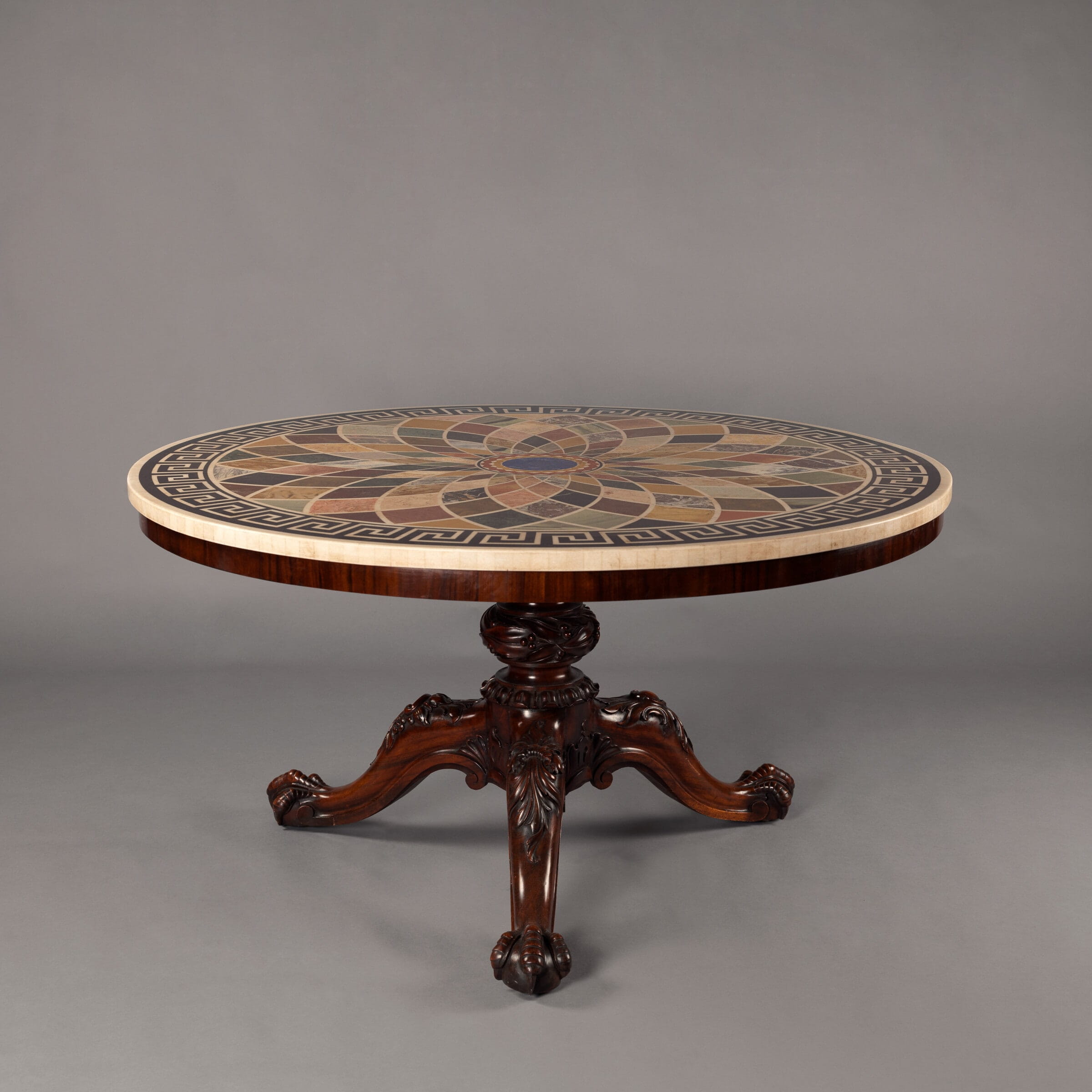 An Impressive Goncalo Alves and Mahogany Centre Table with a Specimen Marble Top