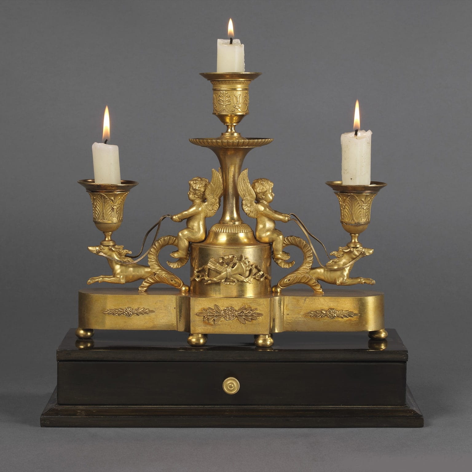 A Fine Louis XVI Style Gilt-Bronze and Ebony Three-Light Desk Stand