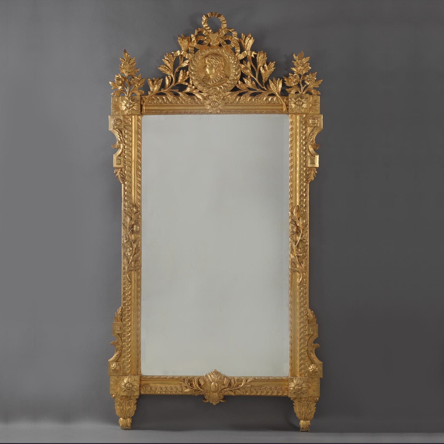 A Fine Louis XVI Style Carved Giltwood Mirror