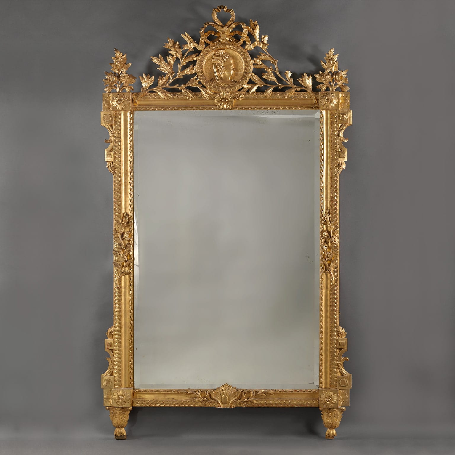 A Fine Louis XVI Style Carved Giltwood Mirror