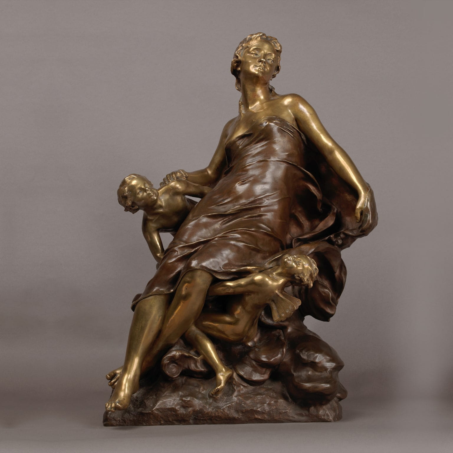 'Cupid & Psyche' An Important Parcel-Gilt and Patinated Bronze Figure
