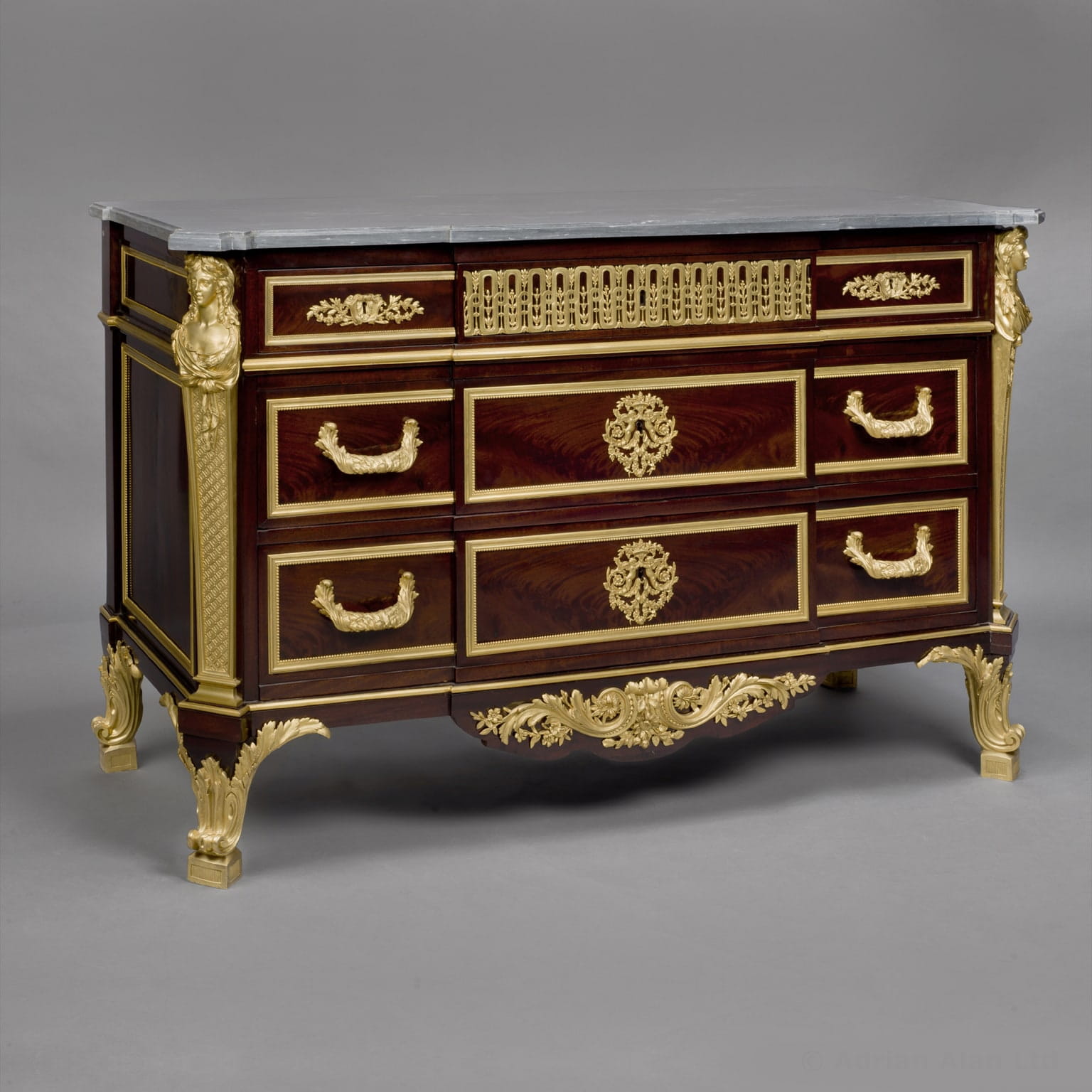 A Fine Louis XVI Style Gilt-Bronze Mounted Mahogany Commode