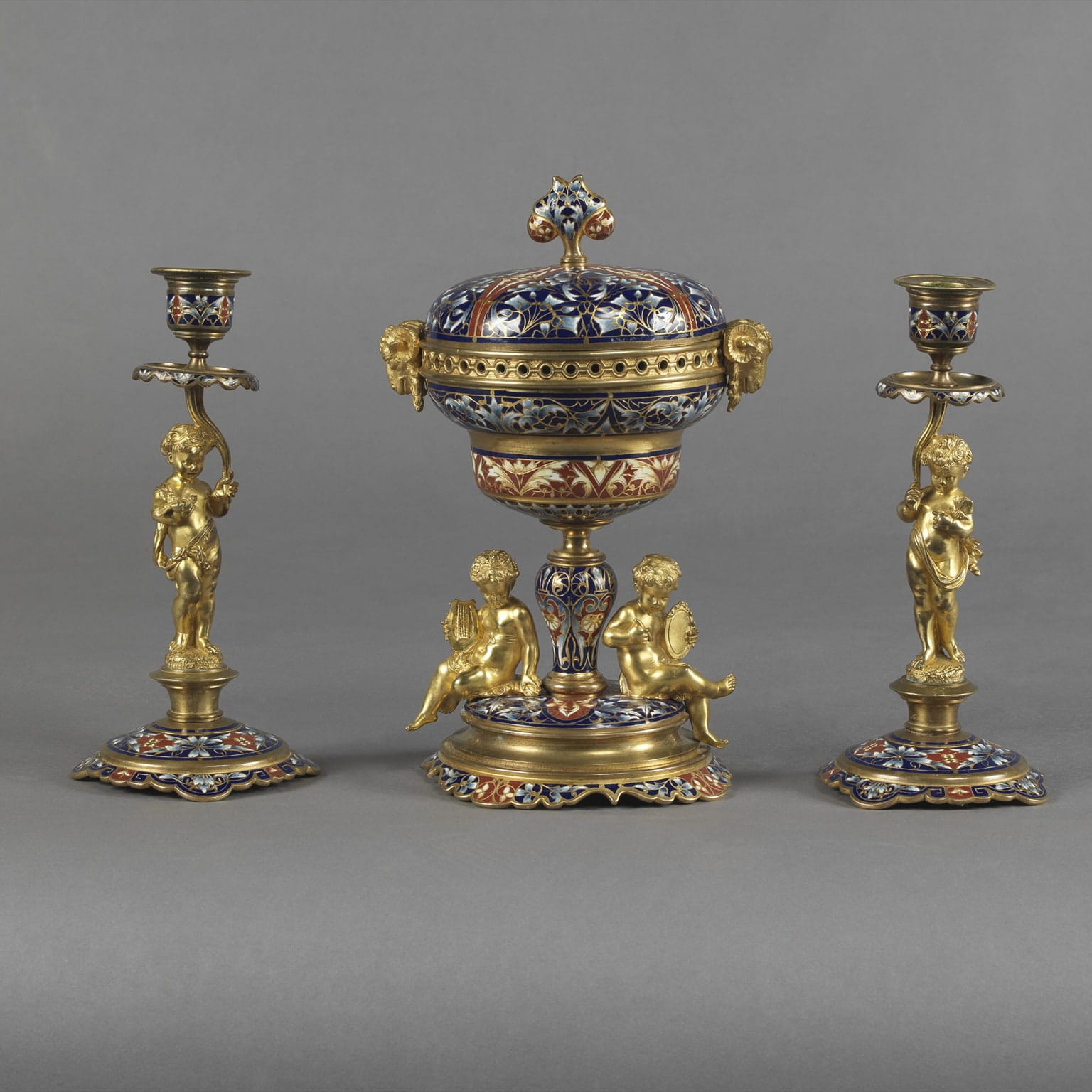 A Fine Gilt-Bronze and Champlevé Enamel Garniture Set