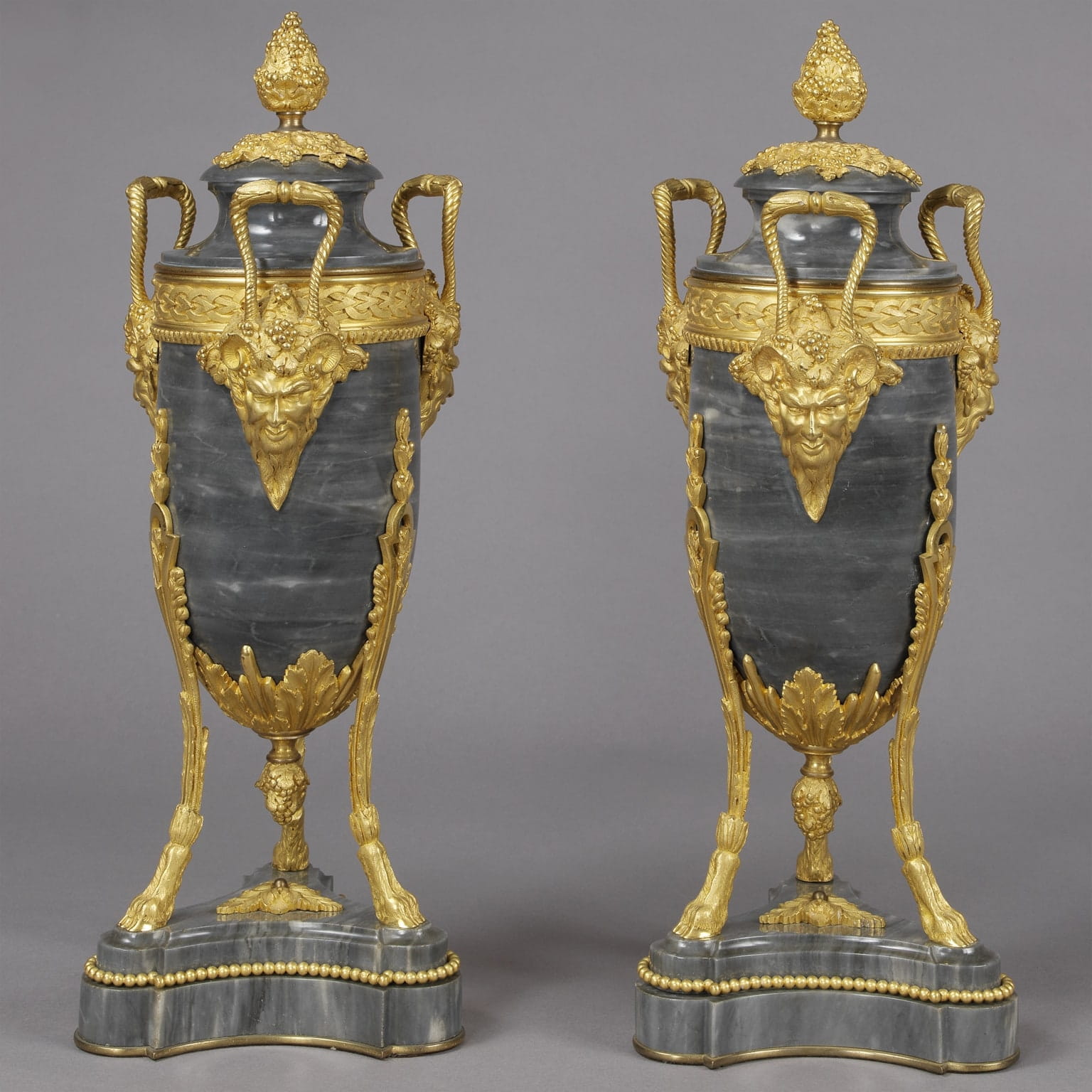 A Fine Pair Of Louis XVI Style Bleu Turquin Marble Urns