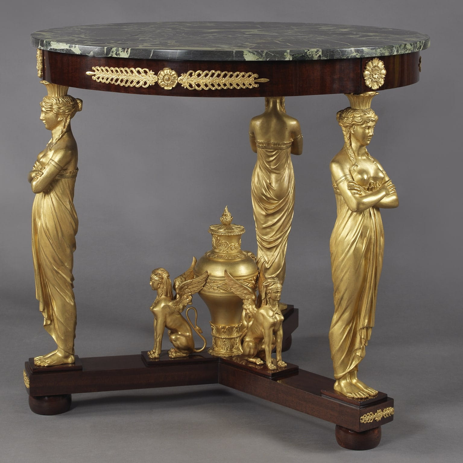 A Fine Empire Style Gilt-Bronze and Mahogany Gueridon